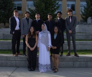 Jasmine is standing with all her peers who are VPs in the MSA which are standing on EME stairs